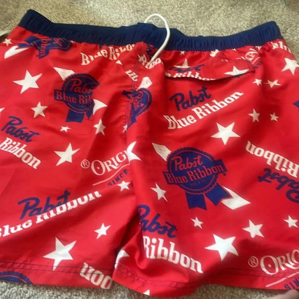Pabst Blue Ribbon board shorts on red white and blue size XXl